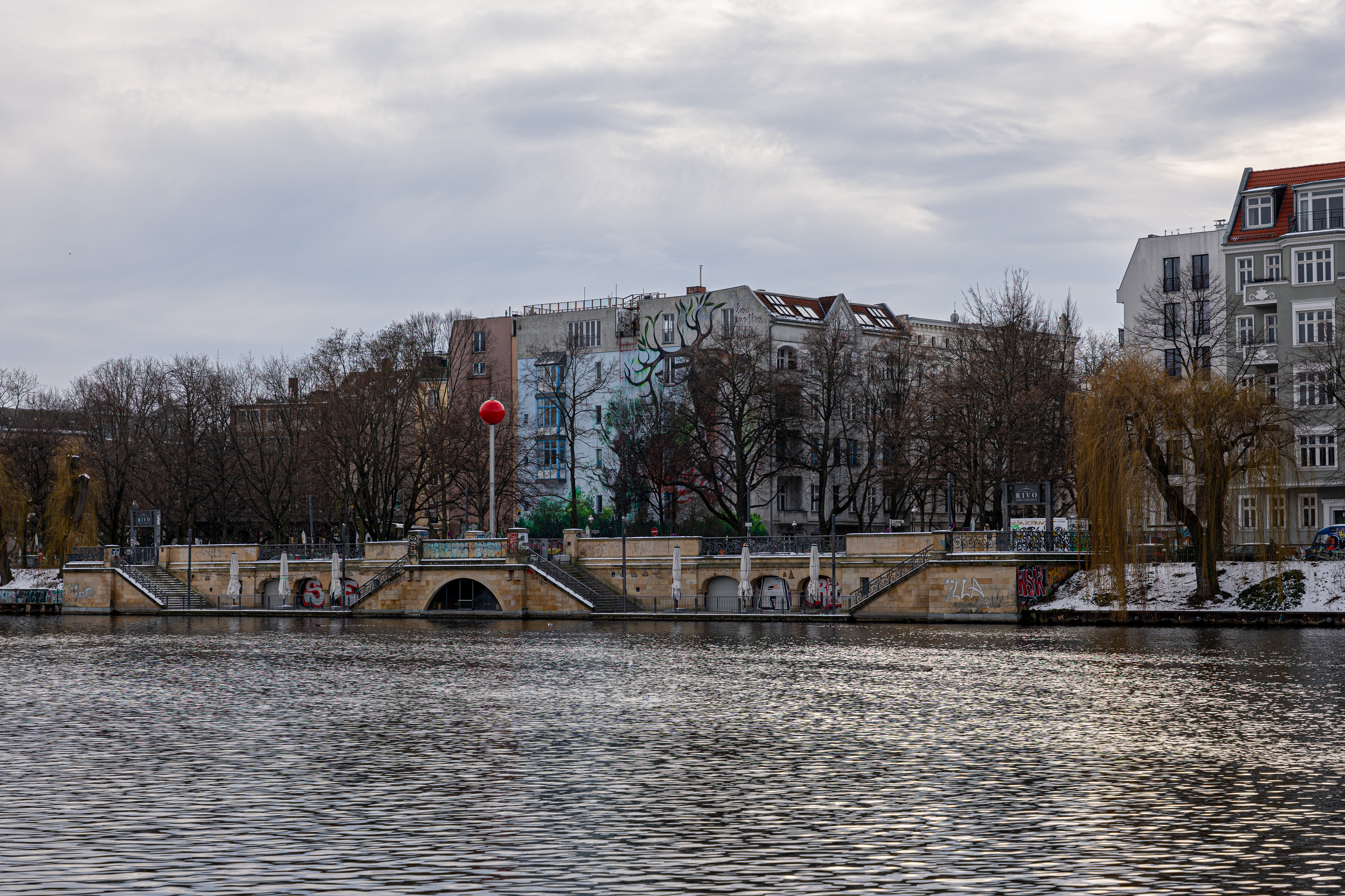 View across the Spree with a red ball in the middle.